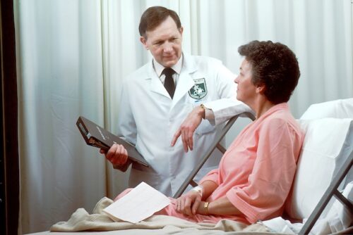 doctor providing informed consent to woman
