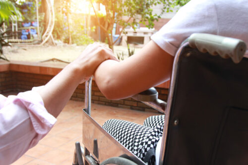 disabled child sitting in a wheelchair