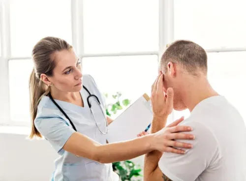 men with doctor having a head problem